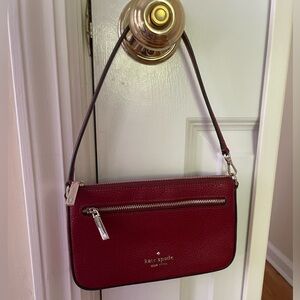 Kate Spade deep red purse, worn once, new condition